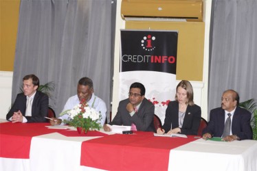 From left are Reynir Gretarsson, Chairman of Creditinfo International; Prime Minister Sam Hinds; Attorney General Anil Nandlall; Canadian High Commission Nicole Giles; and Deputy Governor of the Bank of Guyana Dr. Gobind Ganga at the launch of Creditinfo at the Georgetown Club yesterday. (Photo by Arian Browne)