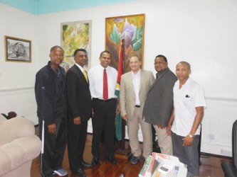 SAMBO GATHERING! From left, Carwyn Holland (President of GSCSF), Samuel Sankar, Minister  Dr. Frank Anthony, Dr. Andrey Moshanov (Head of Development FIAS), Jason Fraser(President TTSCSF) and Devon Jones (Vice President GSCSF). 