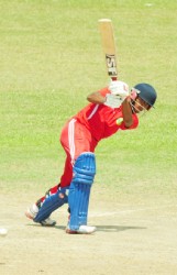 Devendra Bishoo plays a delivery to leg during his innings of 72 yesterday. (Orlando Charles photos) 