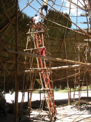 Workers putting the final touches to the benab in St Cuthbert's Mission (Arian Browne photo)