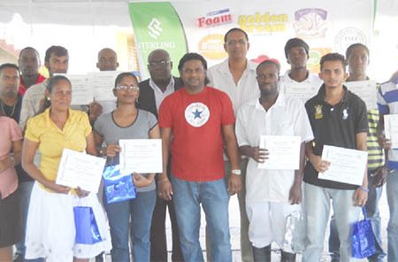 Graduates from Sterling Products Limited’s literacy programme and coordinators and other officials after the graduation exercise
