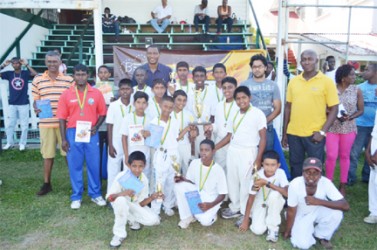 The victorious GYO team along with GCA president Roger Harper and Banks DIH Limited Malta Supreme Brand Manager Clayton Mackenzie at extreme right.