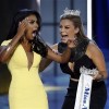 Miss America contestant, Miss New York Nina Davuluri (L) reacts with 2013 Miss America Mallory Hagan after being chosen winner of the 2014 Miss America Pageant in Atlantic City, New Jersey, September 15, 2013.Credit: Reuters/Lucas Jackson
