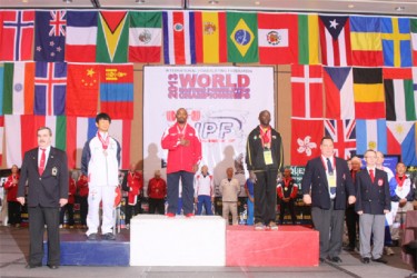 Winston Stoby (right) on the podium at the World Masters Championships last Tuesday in Orlando, Florida. 