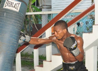 Kishawn ‘Special K’ Simon in action during yesterday’s training session at the Andrew ‘SixHead’ Lewis Gym. (Orlando Charles photo) 