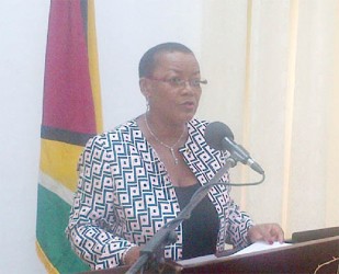 Barbados’ Minister of Foreign Affairs and Trade Maxine McClean speaking to reporters yesterday