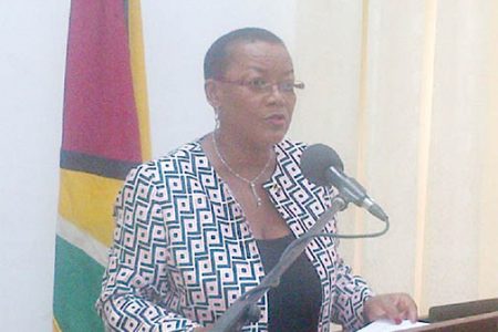 Barbados’ Minister of Foreign Affairs and Trade Maxine McClean speaking to reporters yesterday