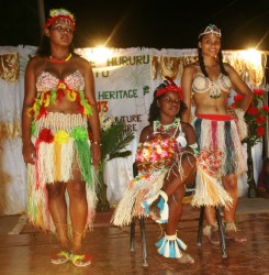 Lensey Adolph, the newly crowned Miss Hururu Heritage 2013, flanked by first runner-up, Malika Russell (right) and Gracelyn Campbell (left) 