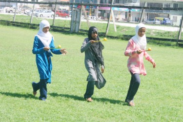Lime and spoon race: Three girls in the ‘Lime and Spoon’ race 
