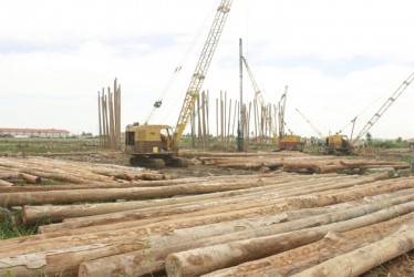 Heavy rains have halted the pile driving for the MovieTowne complex at Turkeyen, which is running behind schedule by at least a month 