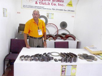 Company Director for Guyana Brakes and Clutch Co, Ushkumar Purandat, showcases the remanufactured brakes and clutches. 