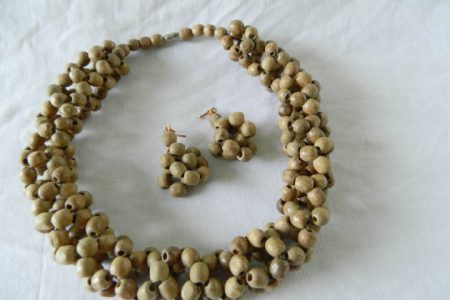 A necklace set designed from seeds by craftswoman Juliana Hughes. Hughes needs help raising money to cover airfare and accommodation to participate in the Crafts of America Festival in Ecuador.