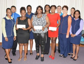 The prize winners with representatives from the bank