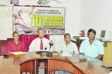 President of the AAG, Aubrey Hutson making a point at yesterday’s launch of the 11th annual South American 10km Classic. (Orlando Charles photo)  