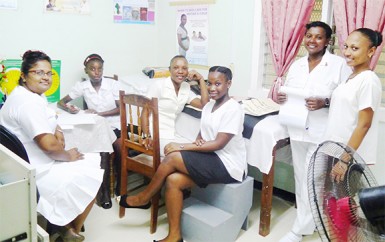 Head nurse of Lichfield Health Centre, Soma Persaud, and other staff taking a  break from their work 