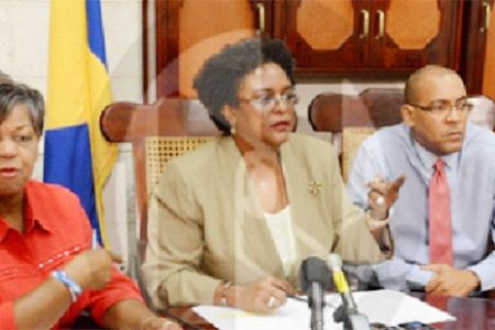 Opposition leader Mia Mottley (centre) flanked by MPs Cynthia Forde (left), Kerrie Symmonds and Trevor Prescod. 