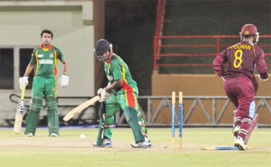 The West Indies U19s celebrate the wicket of Mossadek Saikat. (Orlando Charles photo) 