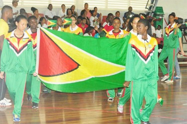 Guyana’s delegation arriving at the Ismay van Wilgen Sporthal for the opening ceremony of the second leg of this year’s Inter Guiana Games. (Orlando Charles photo)