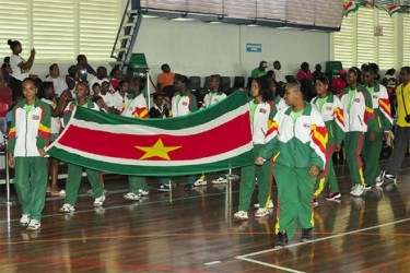 Suriname’s delegation arriving at the Ismay van Wilgen Sporthal for the  opening ceremony of the second leg of this year’s Inter Guiana Games. (Orlando Charles photo) 