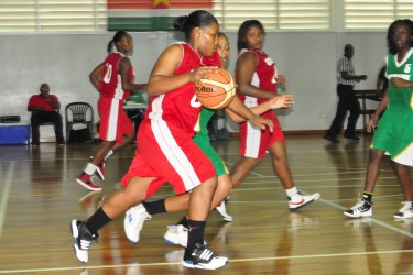 Action during another blowout win for the Guyanese ballers. (Orlando Charles photo)