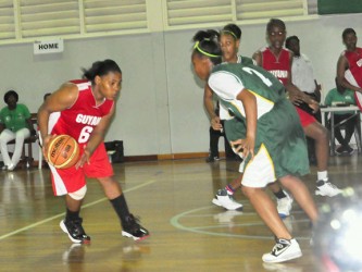 Guyana’s female under-19 basketball captain, Tamara Hunter (no.6) is about to blow by one of her defenders in Saturday 47-29 blowout win. (Orlando Charles photo) 