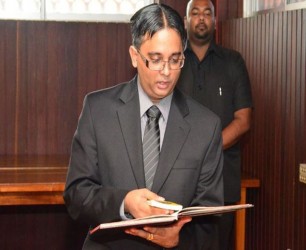 Athmaram Mangar taking the Oath of Office yesterday at the Office of the President (GINA photo)