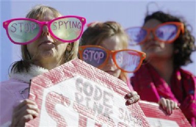Demonstrators from the organization Code Pink wear toy glasses reading “Stop Spying” at the ‘Stop Watching Us: A Rally Against Mass Surveillance’ near the US Capitol in Washington, October 26, 2013. (Reuters/Jonathan Ernst) 