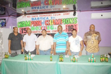 From left to right, Stephen Belle (vice chairman of Bartica NDC), Steve Ninvalle , Leonid Tobin, Banks DIH Branch Manager (third from left), Shawn Wilson, Chairman Red Earth Promotions, (fourth from left), Ishwar Dass, Red Earth Promotions Secretary and Leon Nurse.