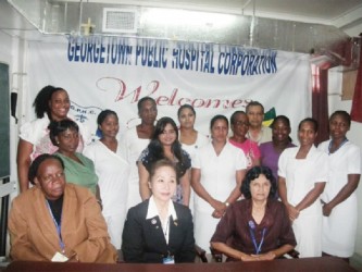 CEO of GPHC Michael Khan (in back row) with the nurses who completed training. In the front row (centre)  is Representative from JICA Sumiko Yoshida and  GPHC staffers. (GINA photo)     