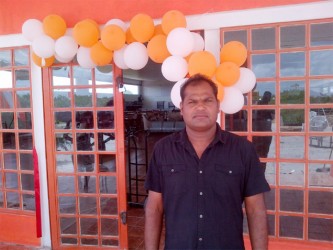 Rajendra Maye at the entrance of the store yesterday afternoon 