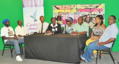 Vizion Sports and Entertainment Agency CEO Wally Fraser (fifth from left) addressing the gathering at the launch of the Caribbean Inter-Club Football Matches while the other members of the launch committee look on. 