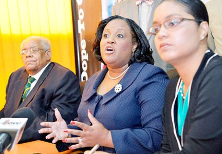 Natalie Neita-Headley (centre) updates the media on the World Anti-Doping Agency’s visit to Jamaica during a press conference on Wednesday. Jamaica Anti-Doping Commission Chairman Dr Herb Elliott (left) and Onika miller, permanent secretary in the Office of the Prime Minister, look on