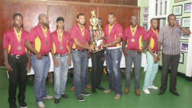 The winning DCC team along with President Alfred Mentore (far right) 