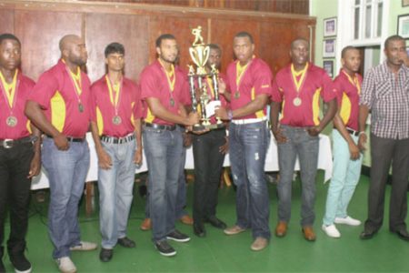 The winning DCC team along with President Alfred Mentore (far right)