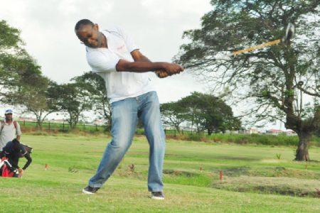OFF YOU GO! Gregory Dean, Digicel CEO tees off to get this year’s Guyana Open golf tournament underway yesterday morning at the Lusignan Golf Club. (Orlando Charles photo>