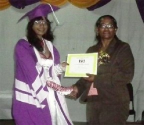 President’s College and Guyana’s top CAPE student Shalita Appadu  receiving her certificate 