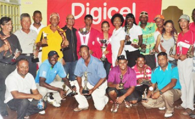 The winners of the 2013 Digicel sponsored Guyana Open with their trophies. (Orlando Charles photo) 