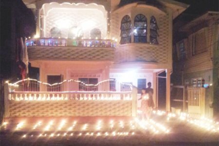 A well-lit house in Alexander Village on Sunday night for the celebration of Diwali (Photo by Tifaine Rutherford)