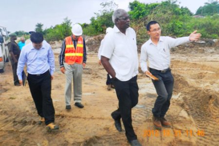  Minister of Works Robeson Benn on a tour of the runway extension works on Thursday.