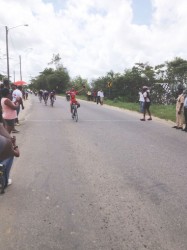 Well Done! National rider, Alanzo Greaves celebrating after crossing the finish line in yesterday’s inaugural United Bike Shop 70-mile road race. 