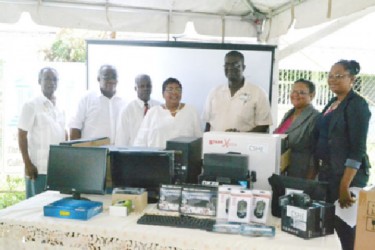 Representatives of the various technical institutes pose for a photo with their equipment along with Inge Nathoo and Chairman of the TVET council and the TVET Director Clinton Williams and Sydney Walters respectively. (Government Information Agency photo) 