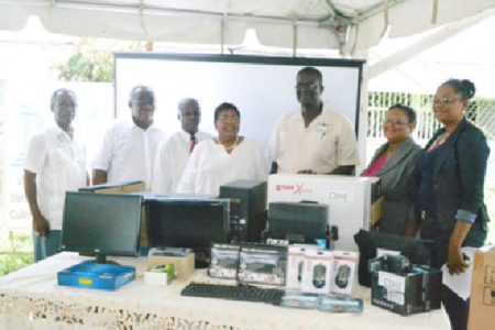 Representatives of the various technical institutes pose for a photo with their equipment along with Inge Nathoo and Chairman of the TVET council and the TVET Director Clinton Williams and Sydney Walters respectively. (Government Information Agency photo)
