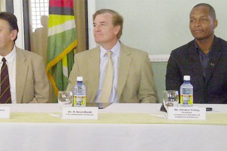 From left SKYE Chief-of-Party Dr. Jan Karpowicz, US Ambassador Brent Hardt and GCCI President Clinton Urling at the launching of the SKYE project job bank on GCCI’s website yesterday
