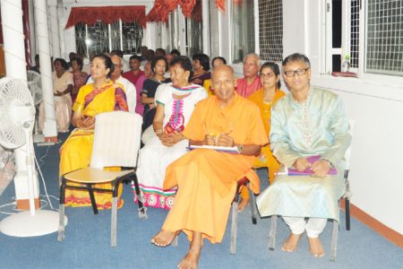 Swami Aksharananda (left in front row) was the guest speaker at the satsangh. At right in front row is Christopher Persaud
