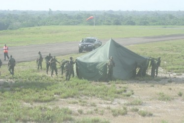 Guyana Defence Force ranks establish the triage area on arrival at the crash site (GINA photo) 