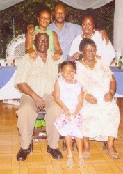 Gordon Alleyne and his family, (back row) his daughter Karen Williams and her husband Owen Williams, daughter Maxine Alleyne (front row) George, his wife Evelyn and their granddaughter Keyanne. 