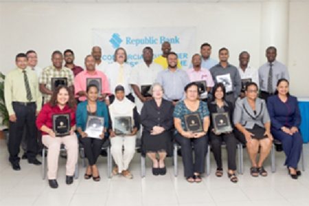 Republic Bank (Guyana) Managing Director John Alves (seventh standing from left) with participants, bank management and staff at the closing ceremony of the Commercial Customer Business Programme. (Republic Bank photo)