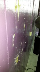 The wall in the salon through which the police were believed to be blindly shooting