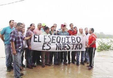 The group of opposition Venezuelan legislators, reportedly at Eteringbang, holding up a sign that says ‘The Essequibo is ours’ (Handout/El Universal)