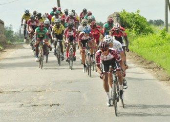 Riders going at it during yesterday’s 35-mile third stage from Wales to Parika. (Orlando Charles photo) 